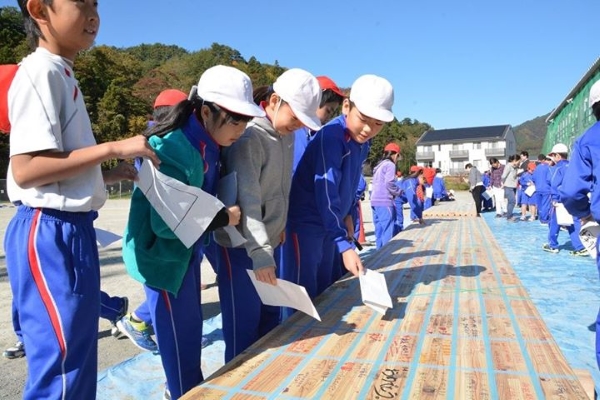 Students writing messages